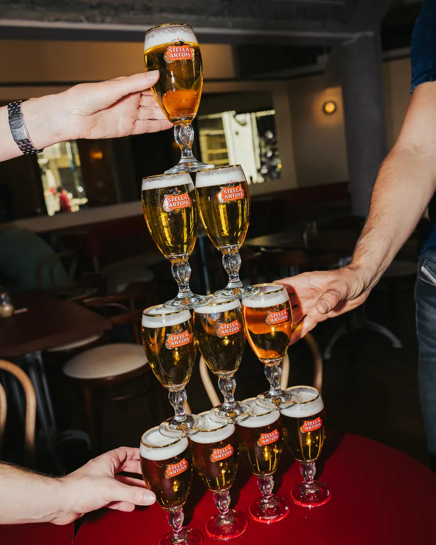 A tower of Stella glasses