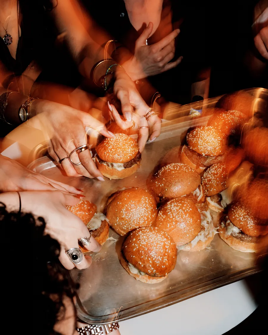 Guests helping themselves to sliders