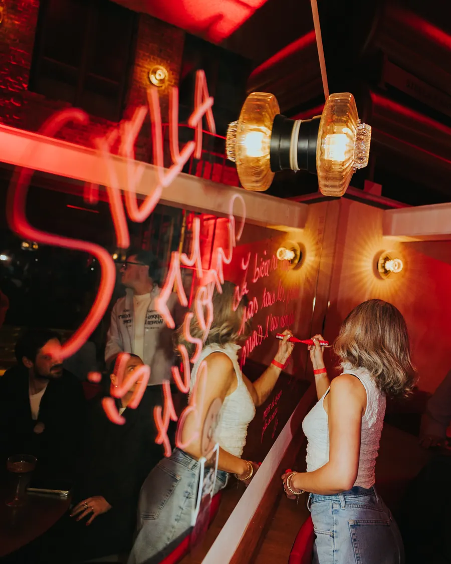 The Stella neon sign at the bar
